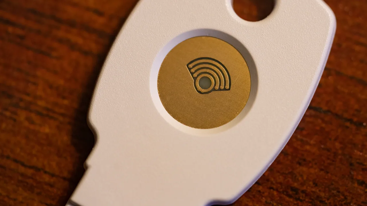 Two-factor authentication security key beside devices